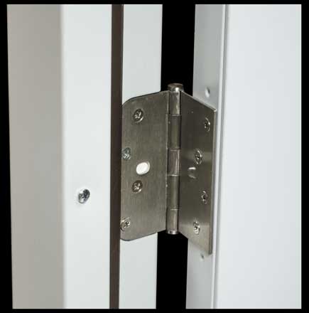 1900-Series hinges mount to door panel surfaces for easy swing changes -- even with pre-installed window lites.